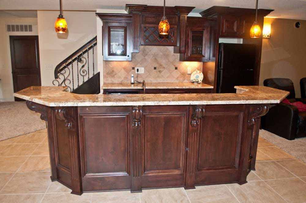 A kitchen with a large island in the middle of it