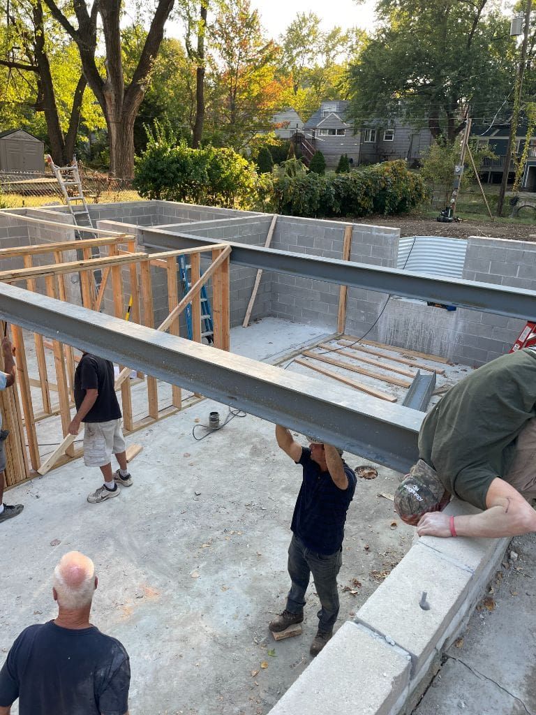 A group of men are working on a construction site.
