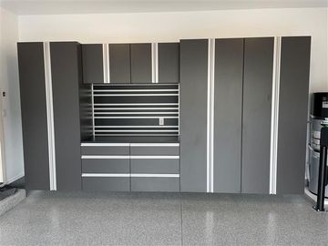 Metallic gray epoxy floor with darker mottled patterns.