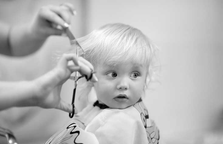 child receiving professional styling