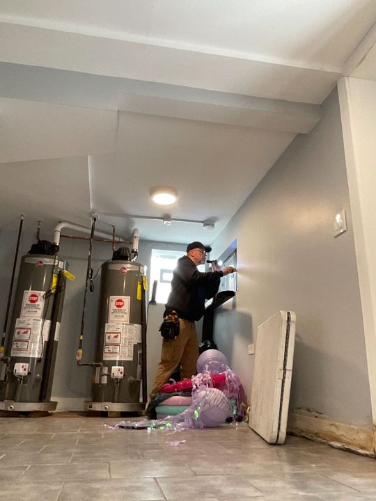 A man doing a home inspection.