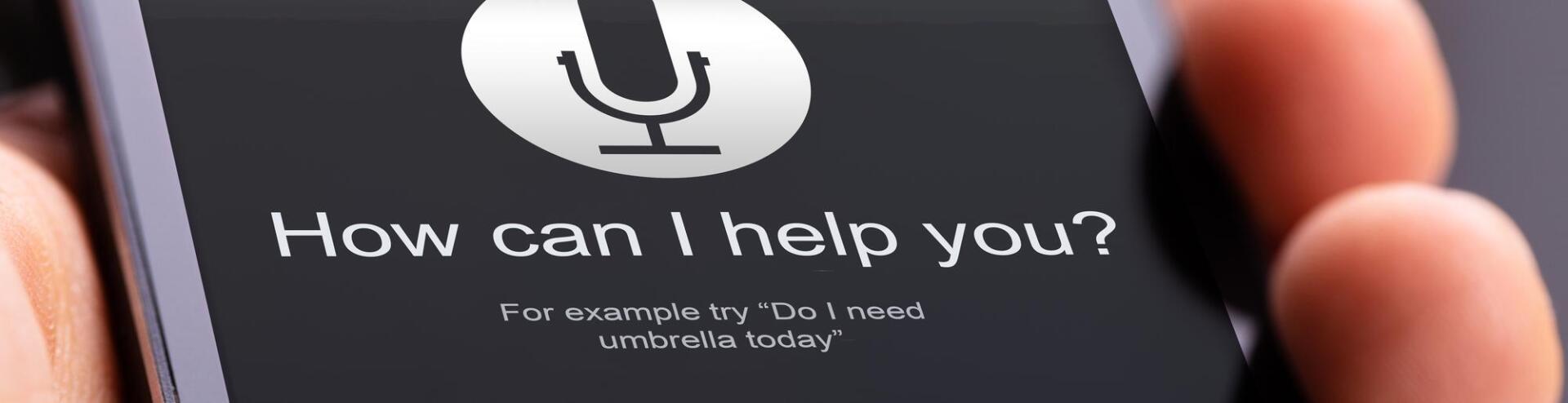 A person is holding a cell phone that says how can i help you