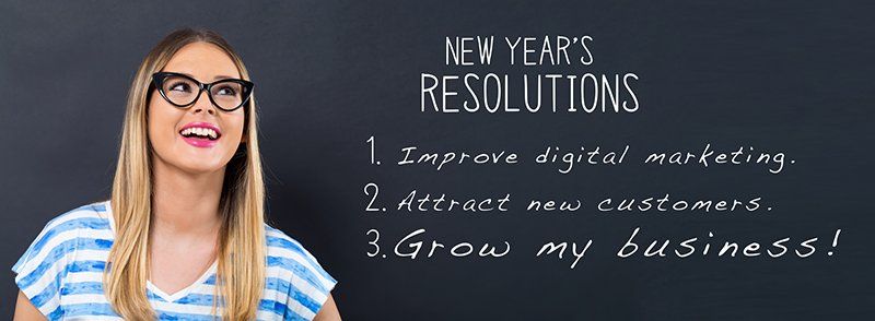 A woman is standing in front of a blackboard with new year 's resolutions written on it.