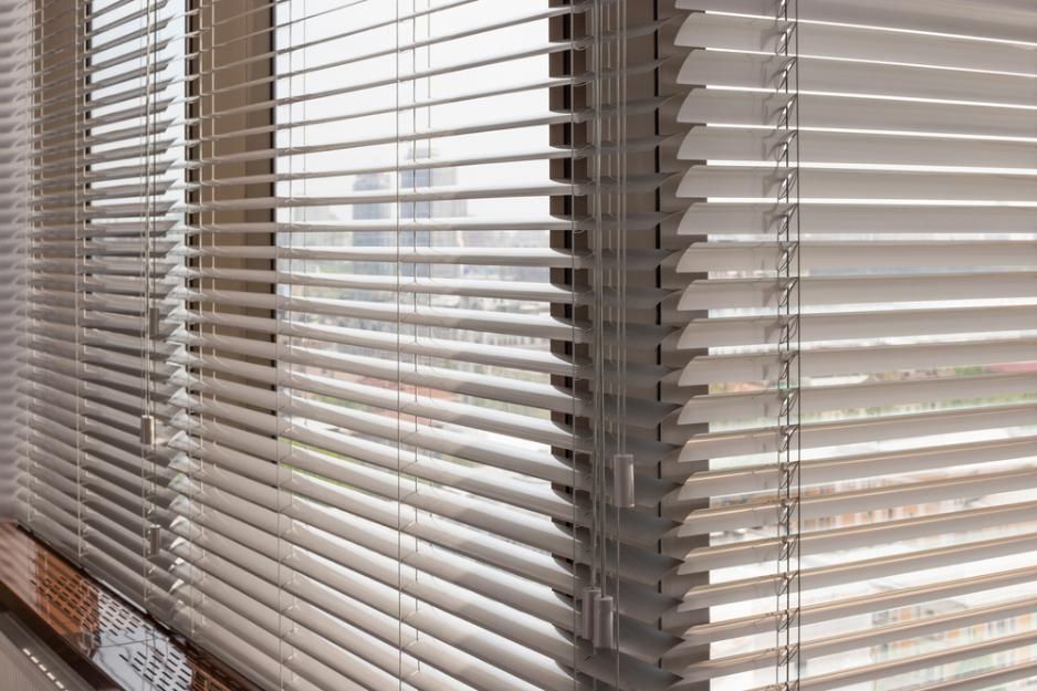 A Close Up Of A Window With Blinds On It — Outdoor Blinds In Toukley, NSW
