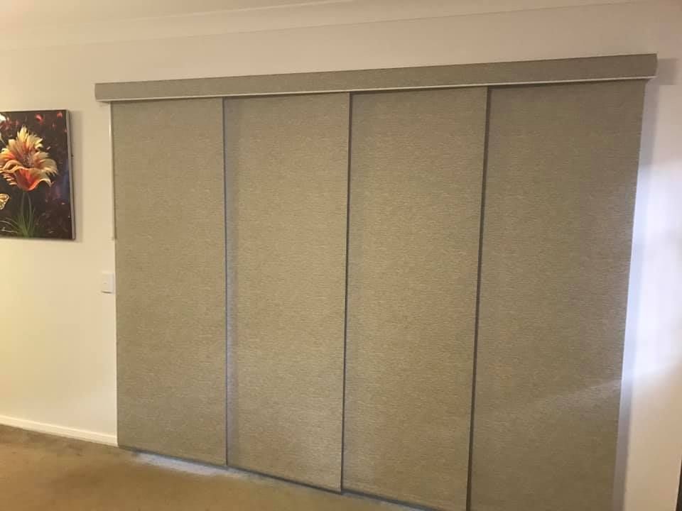 A Picture Of Flowers On The Wall Above The Blinds — Outdoor Blinds In Berkeley Vale, NSW