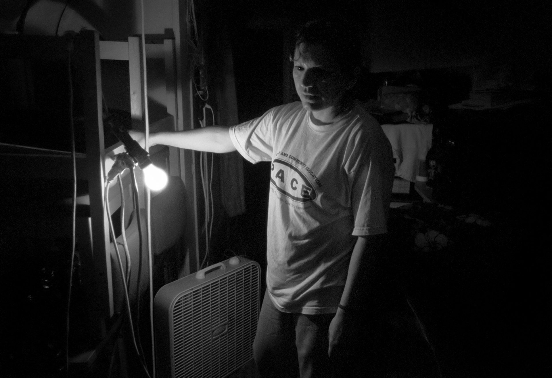 Maria works late into the night packing.