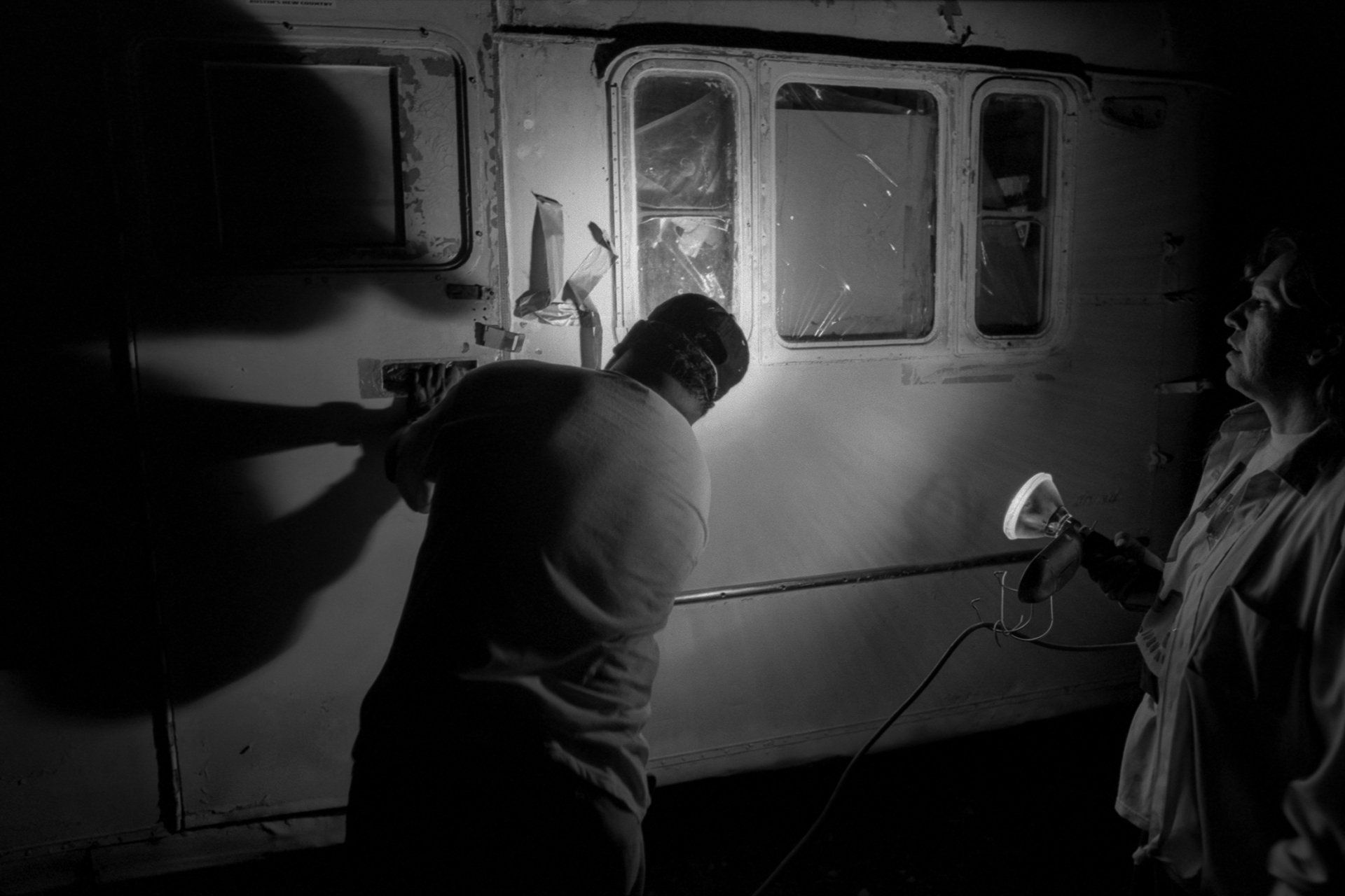 After storing their trailer and camper outside of Austin, Ismael locks it for the last time before heading to Dallas.
