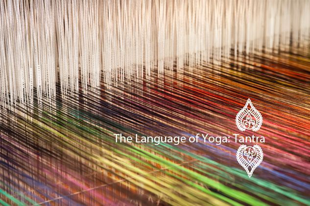 A close up of a loom with a lot of colorful yarn on it.
