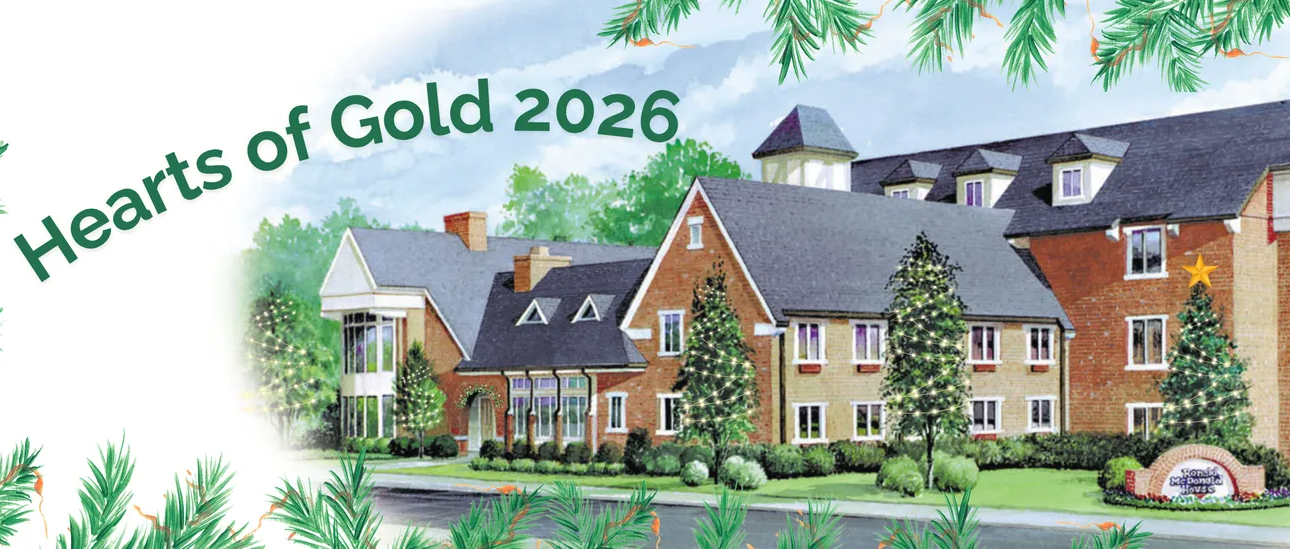 Hearts of Gold 2026 text beside an illustrated brick housing estate with trees and flowers