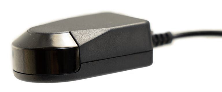 Black rectangular infrared receiver with a black cable.