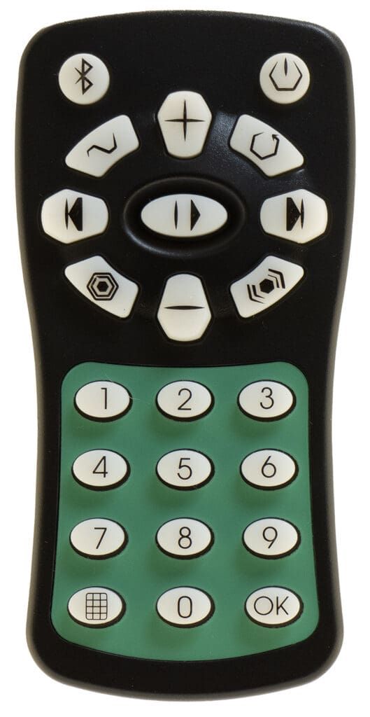 Black remote control with white and green buttons, including number pad.