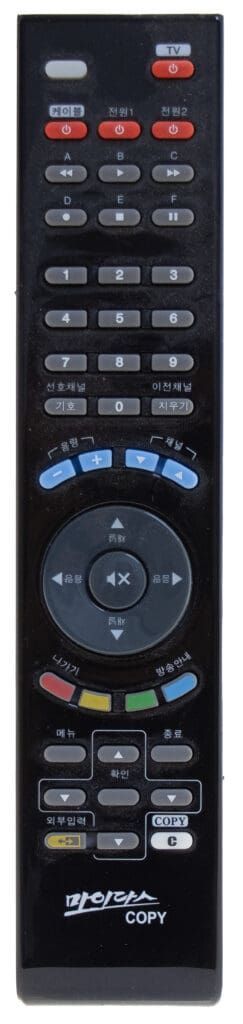Black remote control with various buttons, including directional keys, volume control, and channel selection.