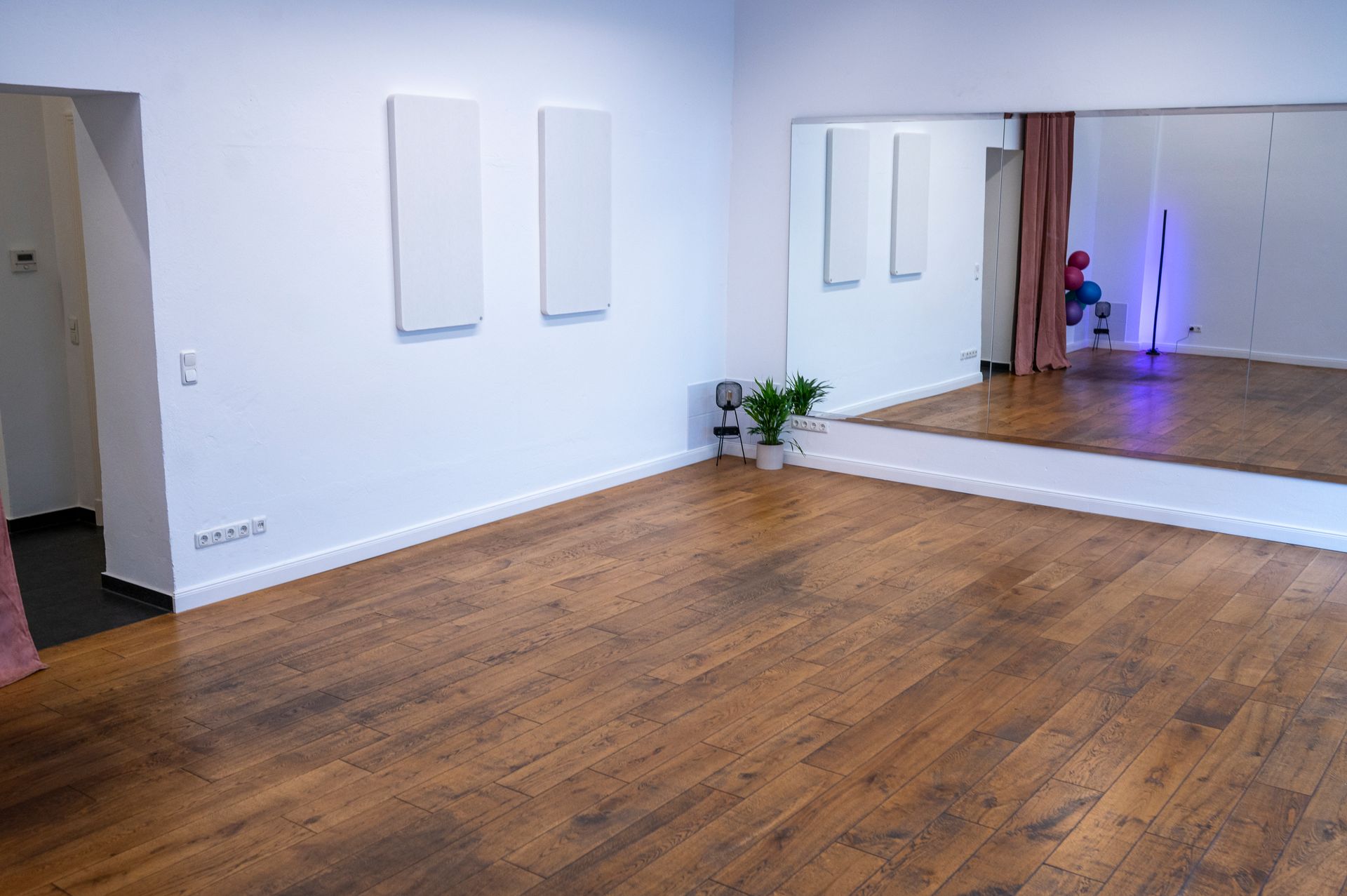 There is a large mirror in the middle of the room.