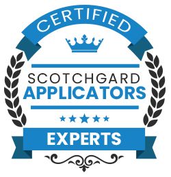 A blue and black circular badge stating "CERTIFIED SCOTCHGARD APPLICATORS EXPERTS" with a crown and five stars.