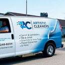 A white work van with blue graphics for