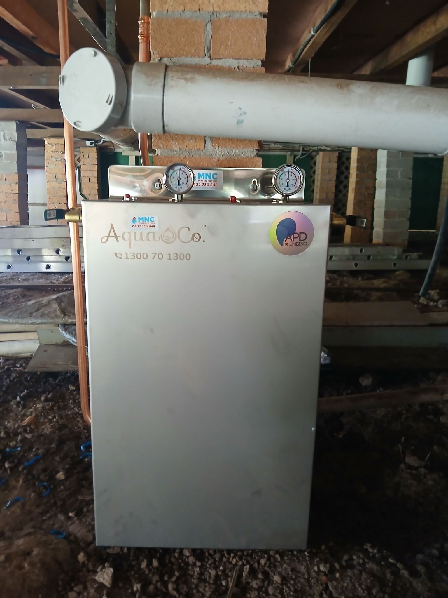 An AquaCo Water Filtration System Installed in a Crawl Space — APD Plumbing In Beechwood, NSW