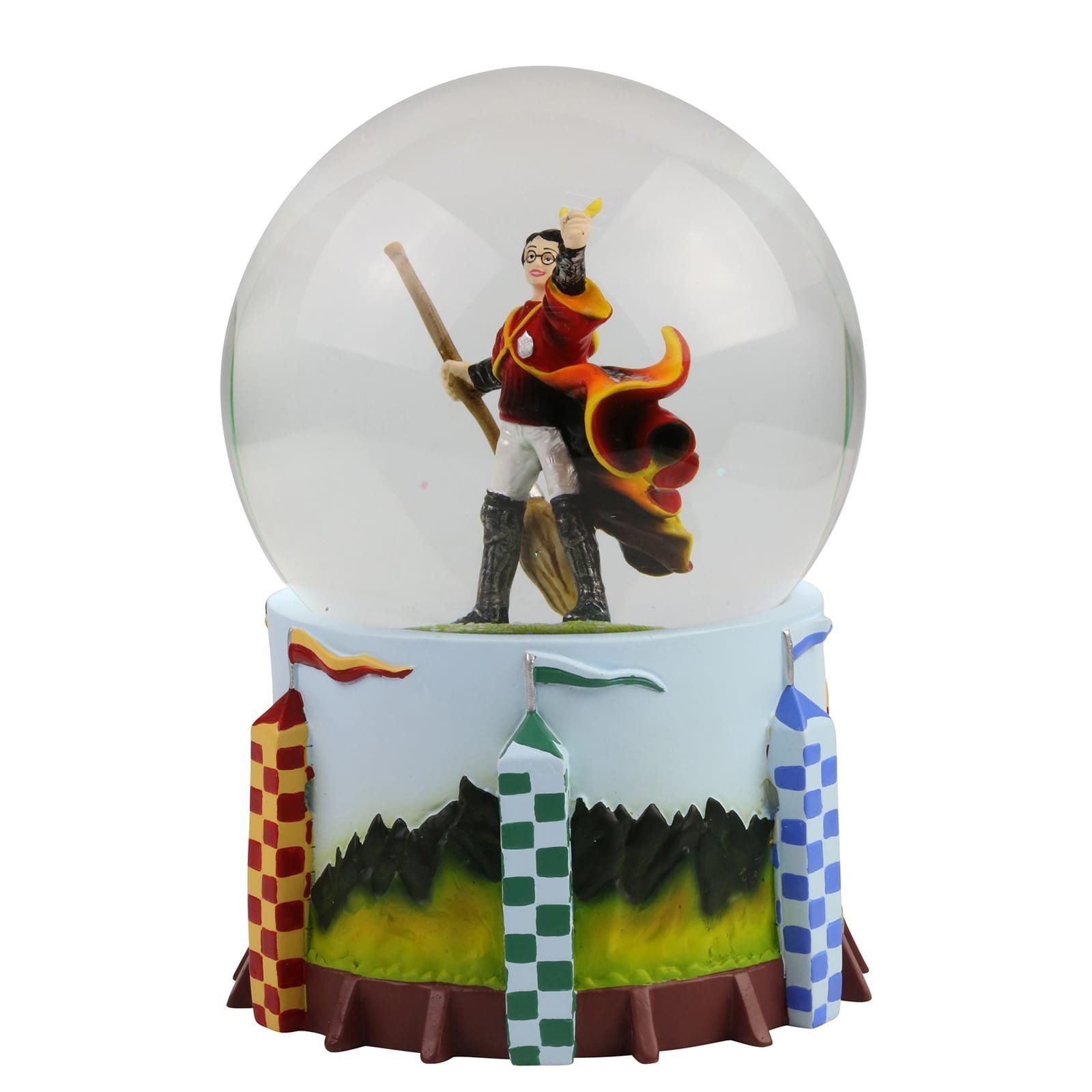 Harry Potter sneeuwbol: Harry op een bezem, in een rood-geel Zwerkbaluniform, met een groene veldbasis.
