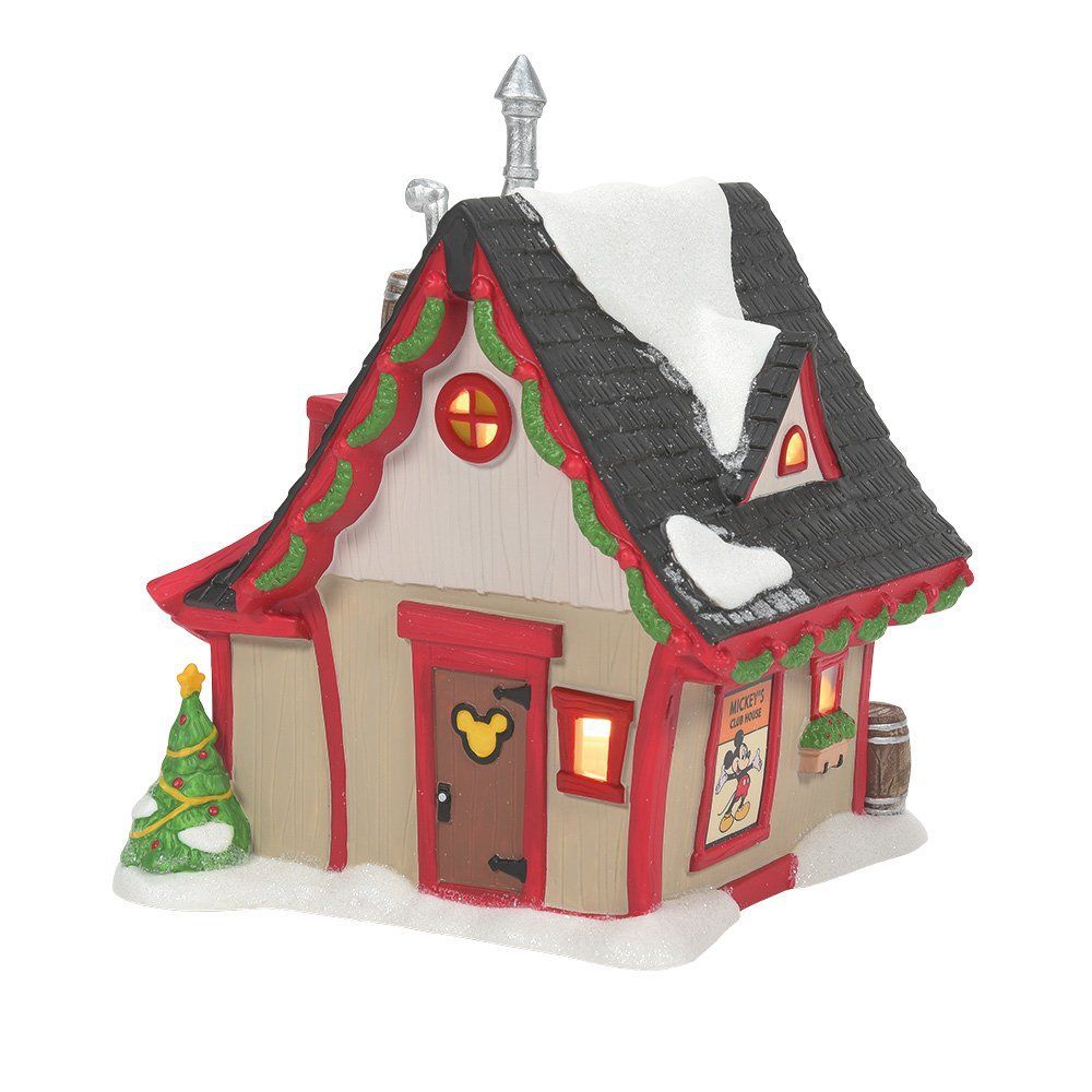 Een kerstdorpje van Disney Clubhouse met sneeuw, rode accenten en het Mickey Mouse-embleem.