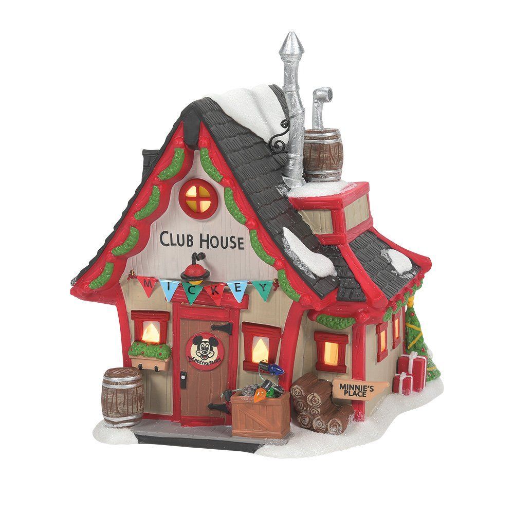 Een kerstdorpje van Disney Clubhouse met sneeuw, rode accenten en het Mickey Mouse-embleem.