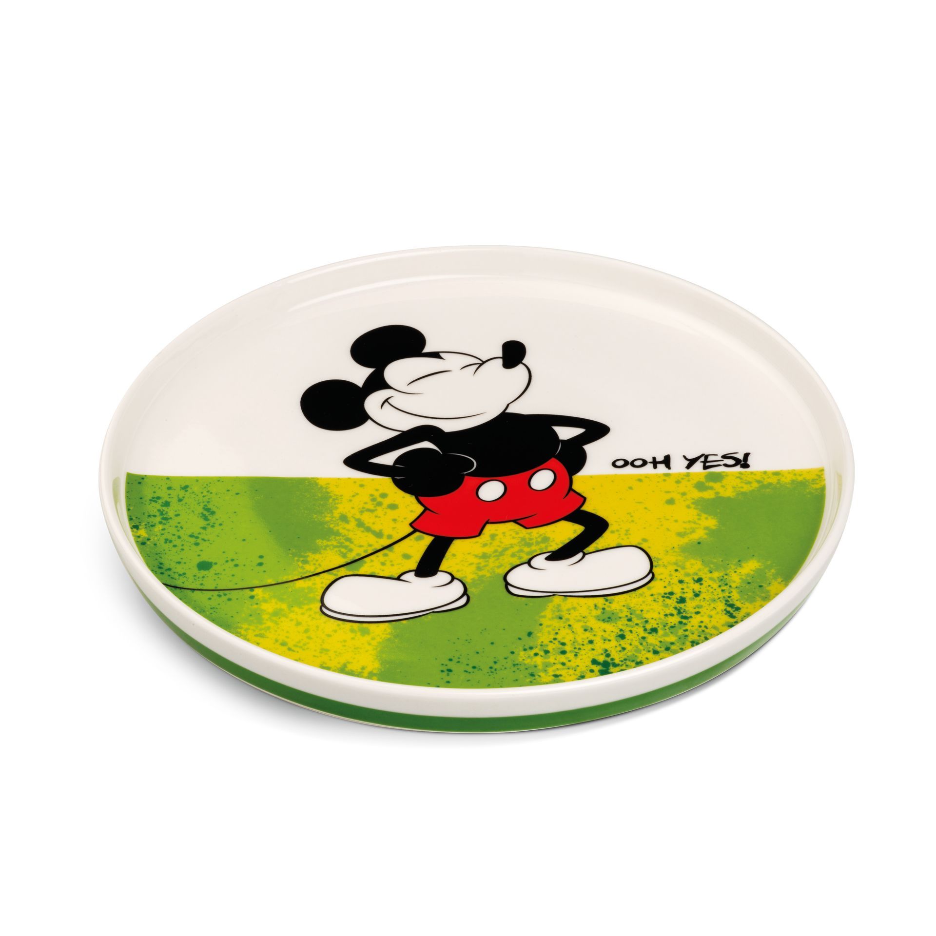 Mickey Mouse-bord met een groene en gele achtergrond. Mickey draagt een rode korte broek, zwarte schoenen en lacht.