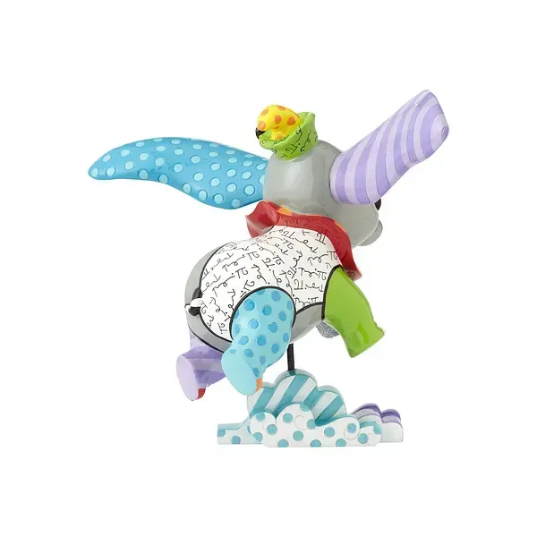 Kleurrijk Dumbo-figuurtje met blauwe, paarse en groene patronen, zittend op een wolk.