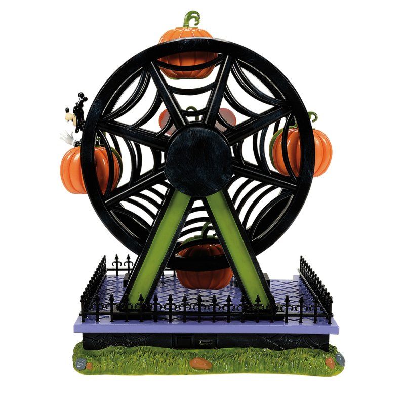 Een Halloween-reuzenrad met pompoenen, een zwart spinnenwebmotief en een Mickey Mouse-figuur.