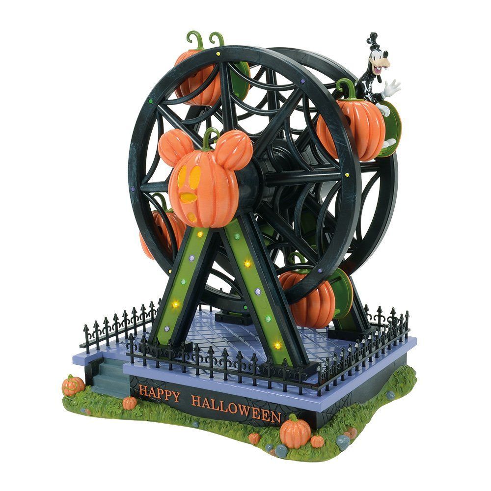 Een reuzenrad met Halloween-thema, versierd met Mickey Mouse-pompoenen en Goofy, en verlicht met de tekst