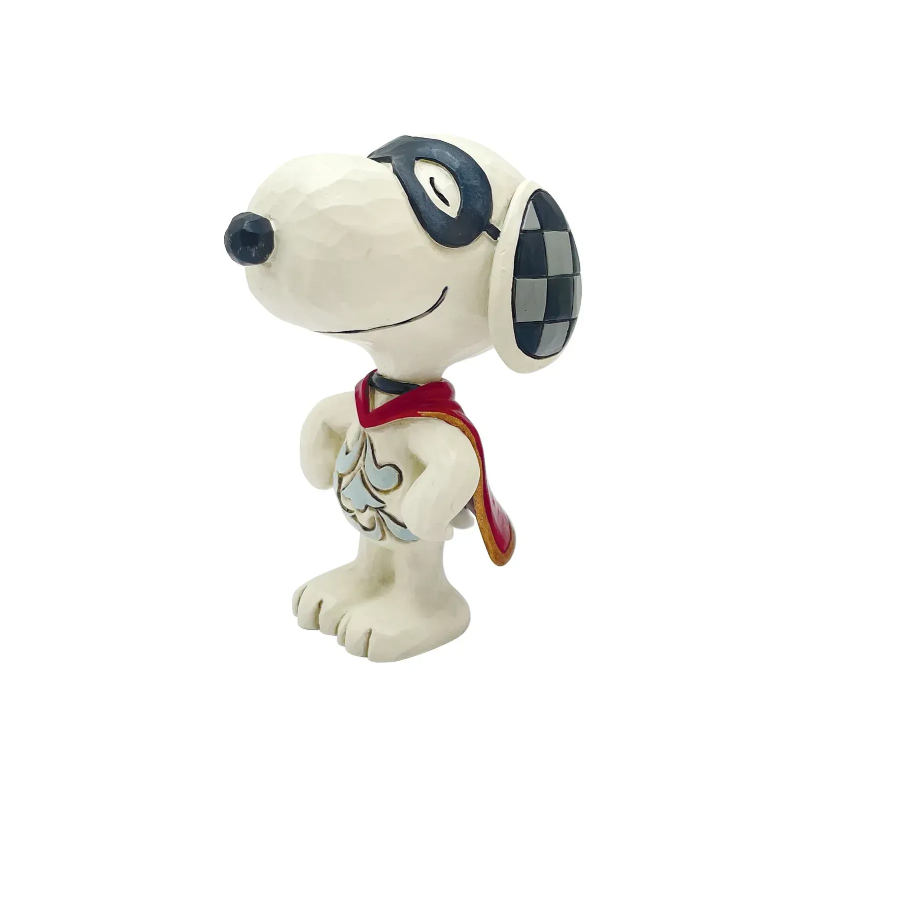 Snoopy-figuurtje als superheld, wit met zwarte accenten, rode cape, staand en lachend.