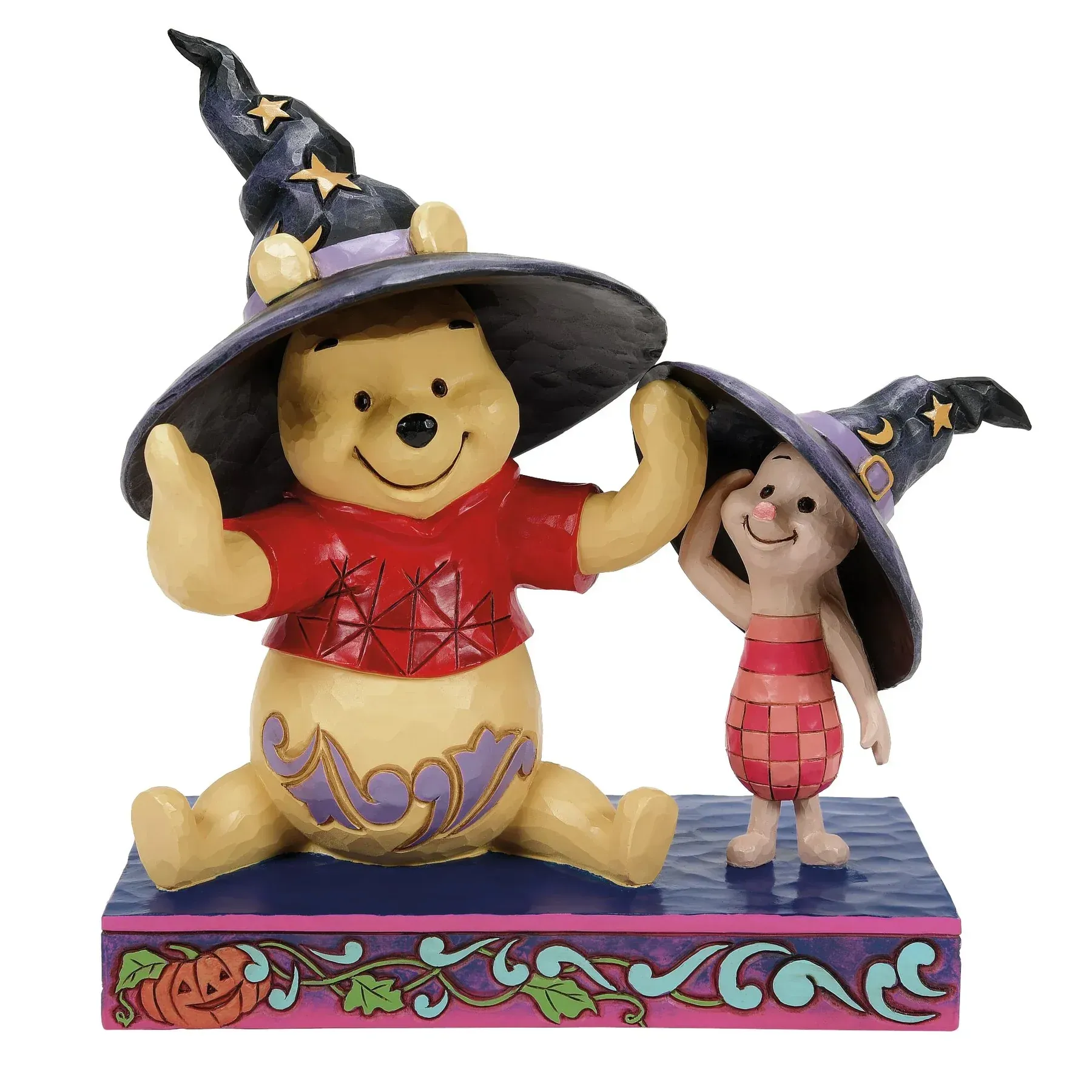 Winnie de Poeh en Knorretje met heksenhoedjes, een Halloween-figuurtje.