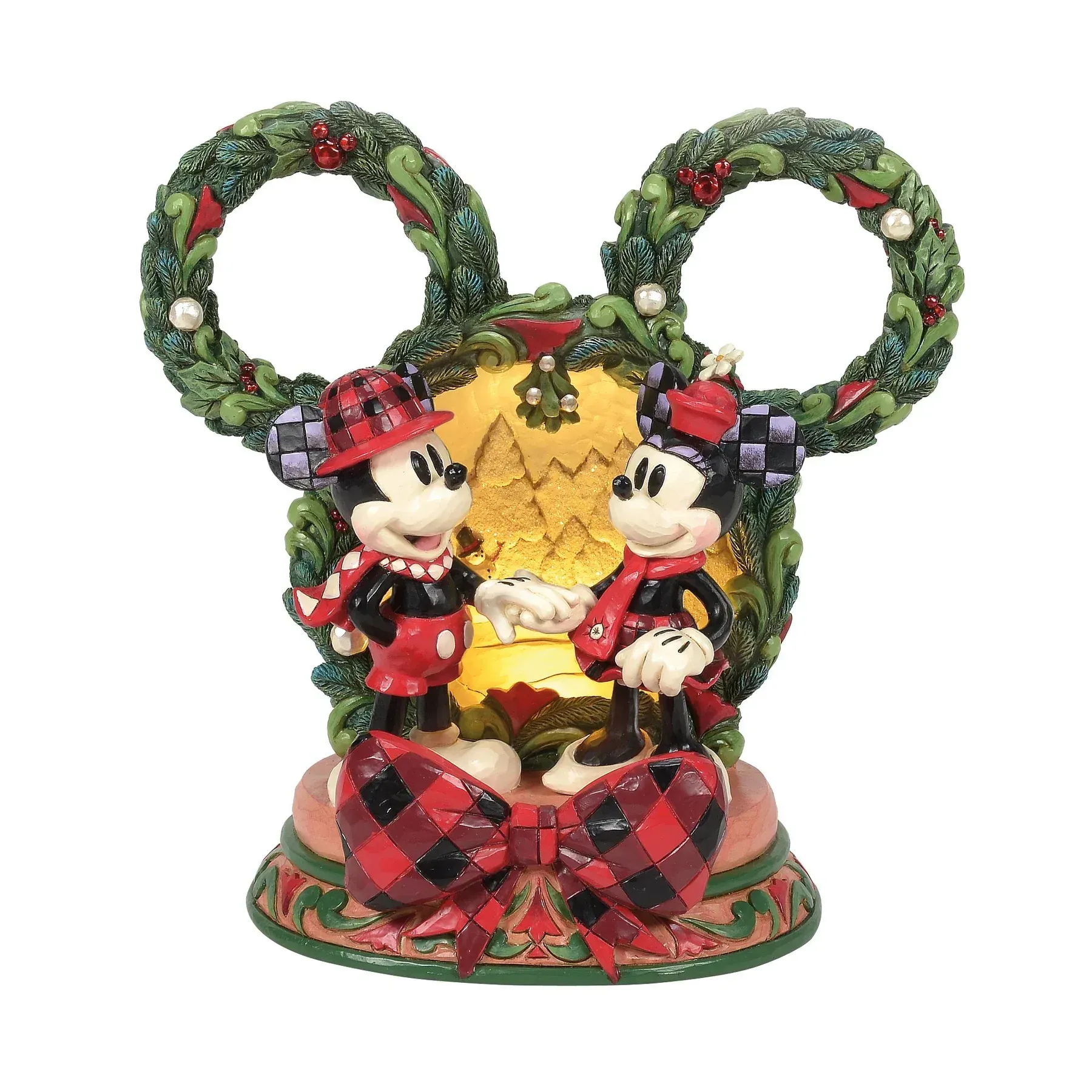 Mickey en Minnie Mouse kerstfiguur met verlichte achtergrond, kransen en geruite strik.