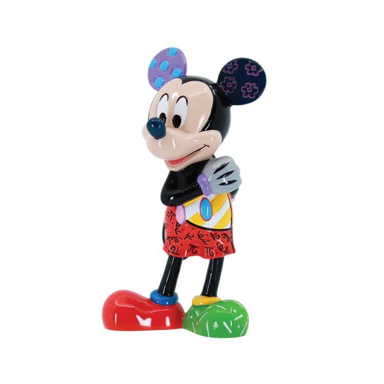 Mickey Mouse-figuurtje, zwart met kleurrijke stippen, bloemdetails en een rode rok.