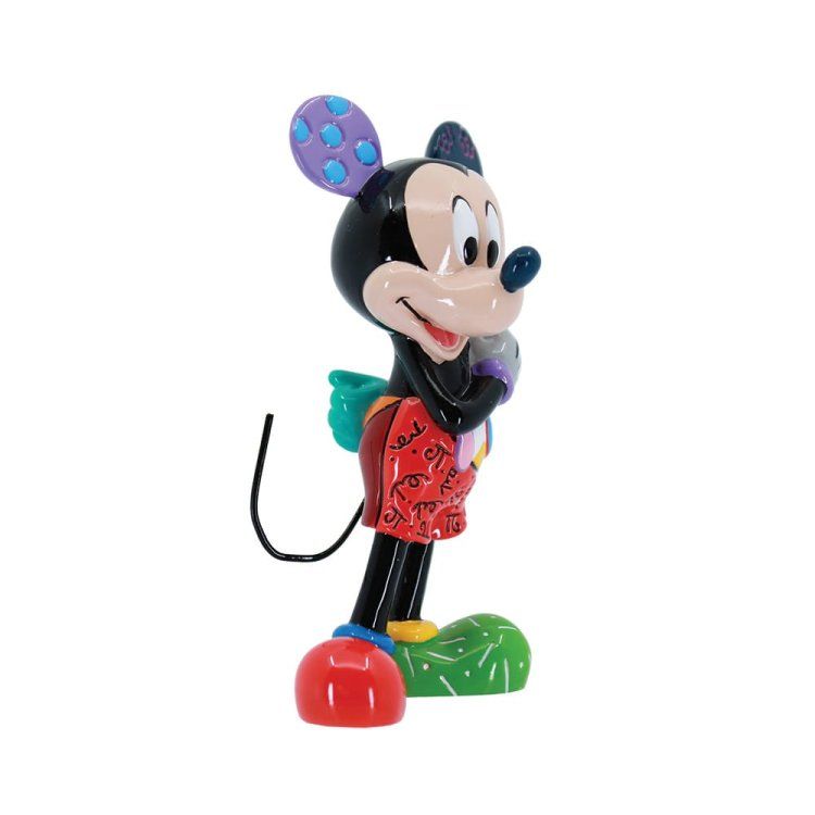Mickey Mouse-figuurtje met een oor met kleurrijke stippen, een rode korte broek en een groene voet.