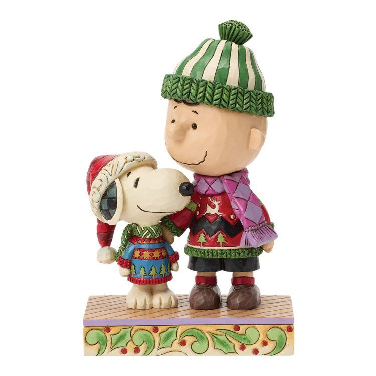 Charlie Brown-figuurtje in een groen-rood feesttenue.