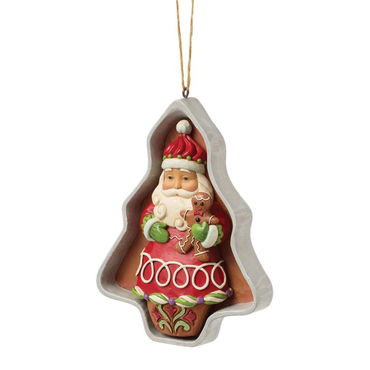 Kerstornament van de Kerstman in een boomvormig frame, met een peperkoekmannetje in zijn armen. Rood, wit en bruin, met een ophangkoordje.