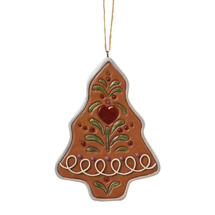 Peperkoek kerstboomversiering met rode en groene details.
