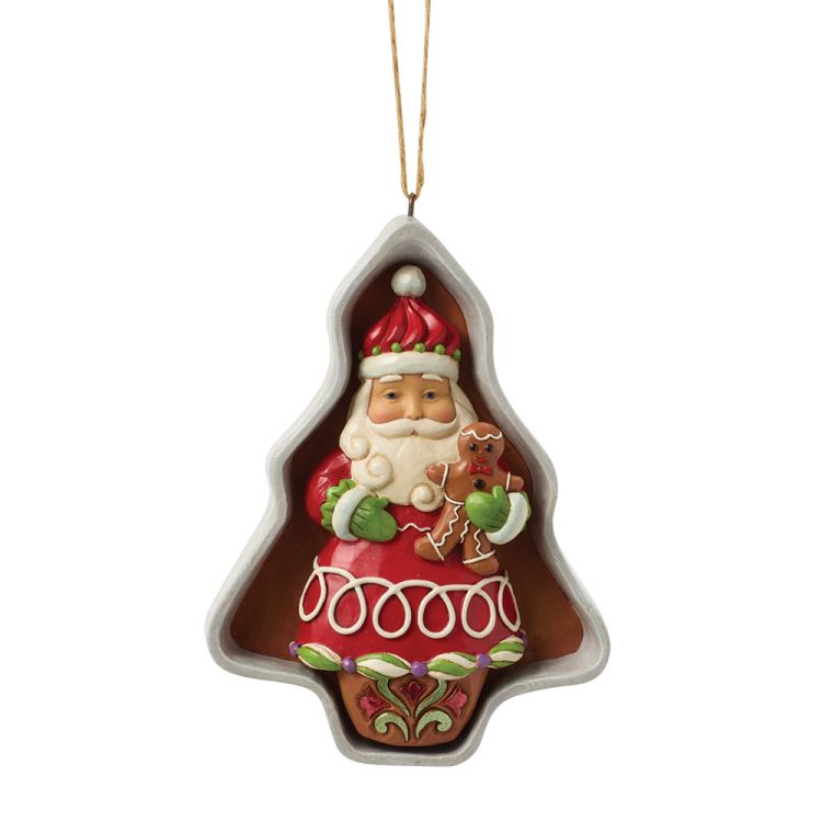Kerstornament van de Kerstman in een boomvormig frame, met een peperkoekmannetje in zijn armen. Rood, wit en bruin, met een ophangkoordje.