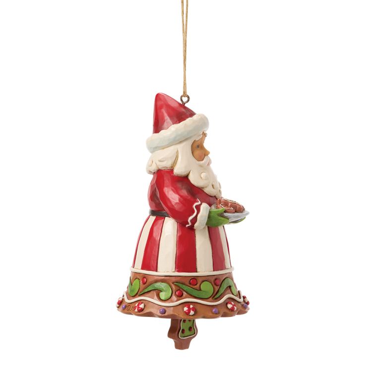Kerstbelornament van de Kerstman die koekjes vasthoudt; rood-wit gestreept pak, groene rand.