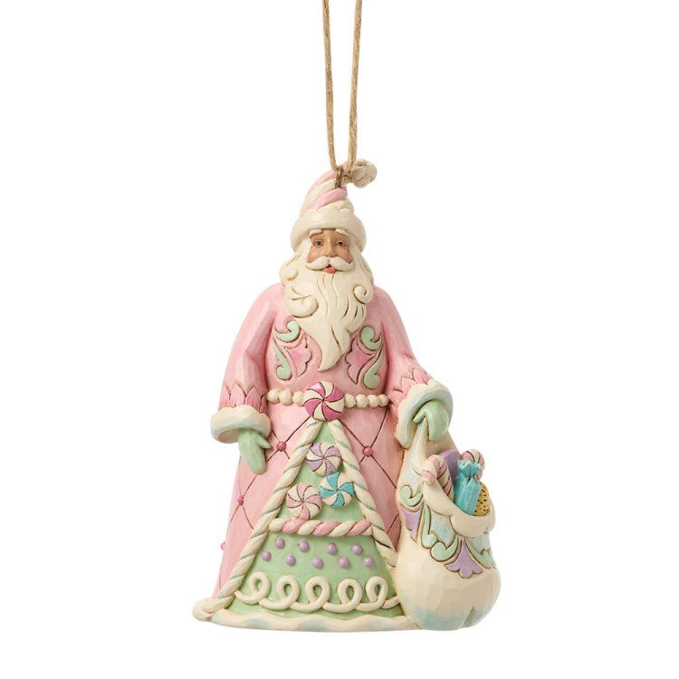 Roze en groene kerstman met een cadeautasje en een beige touwtje om hem op te hangen.