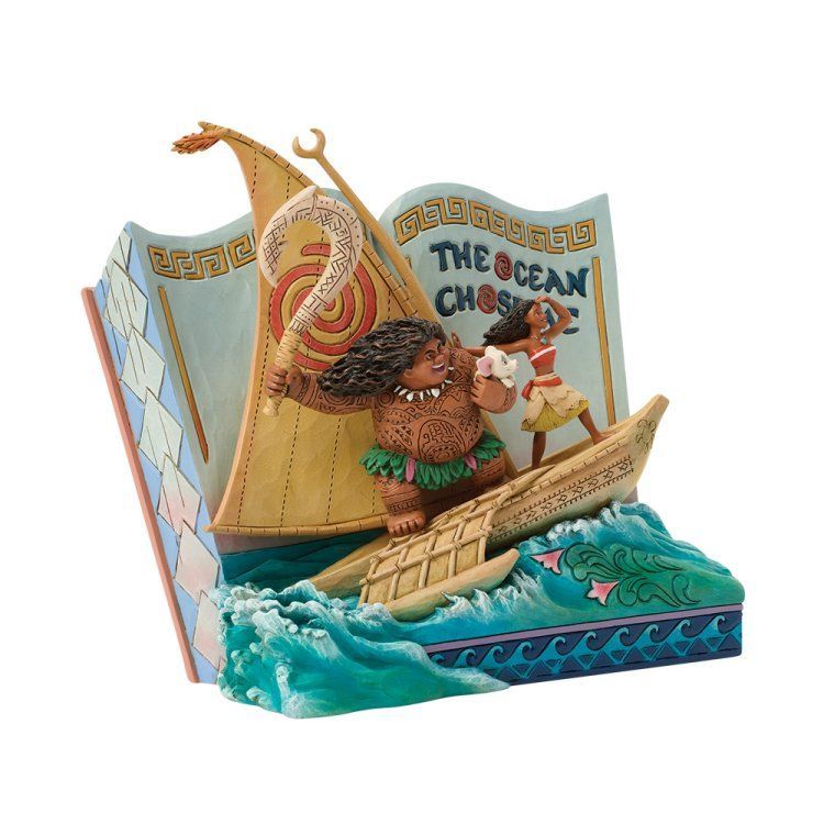 Een scène uit het Moana-verhaal met Maui en Moana in een boot op een golf, met de tekst:
