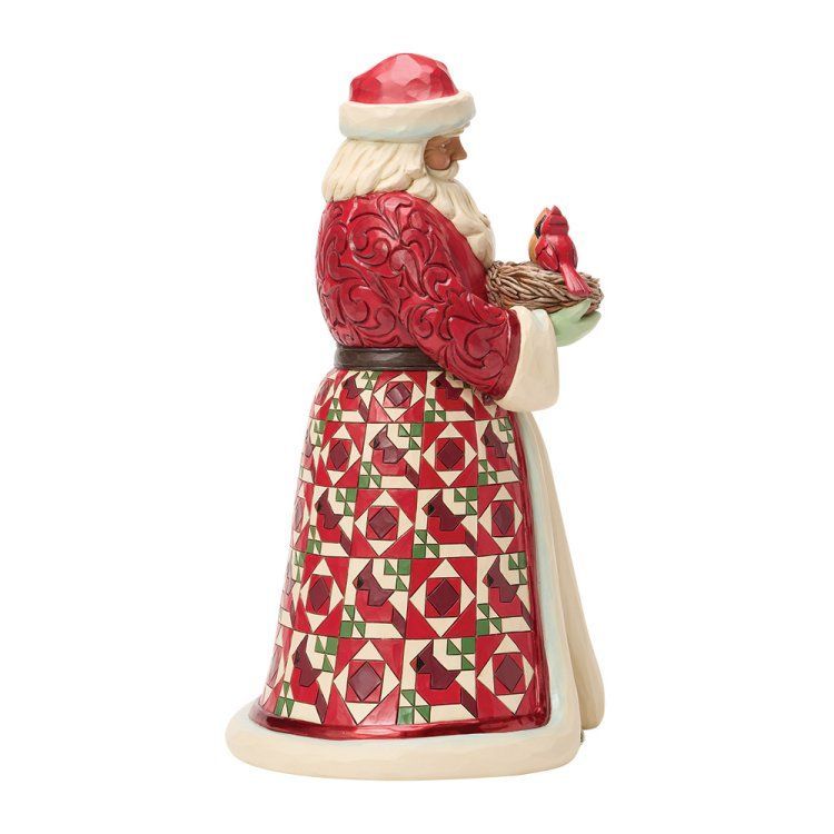 Figuur van de Kerstman in een rode jas met een vogelnestje; kerstthema.
