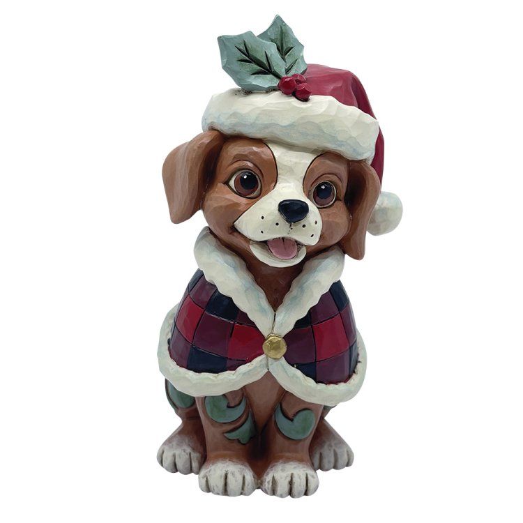Feestelijk puppyfiguurtje met kerstmuts en geruite cape.