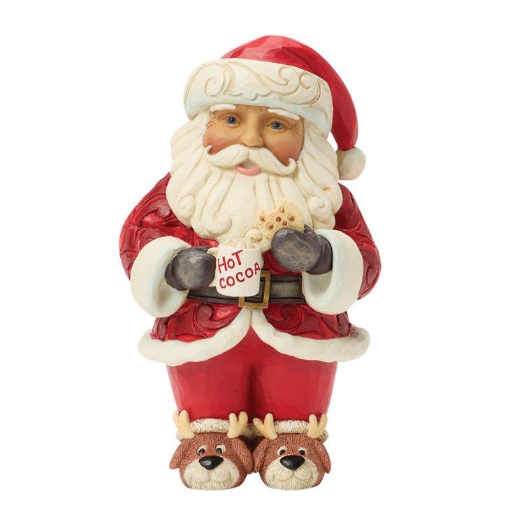 Figuurtje van de Kerstman, rood pak, rendierslippers, met een mok 