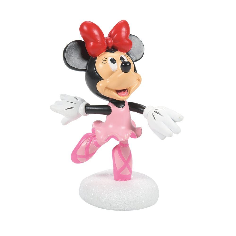 Een Minnie Mouse-figuurtje in een roze balletpakje met rode strik, staand op een besneeuwde sokkel.