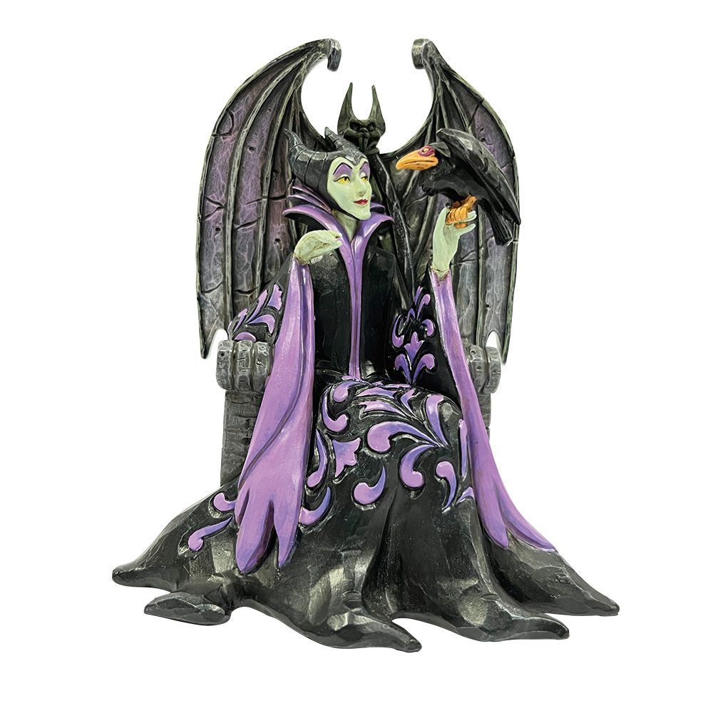 Beeldje van Maleficent op een troon met een raaf. Donkere gewaden, paarse accenten, groene huid.