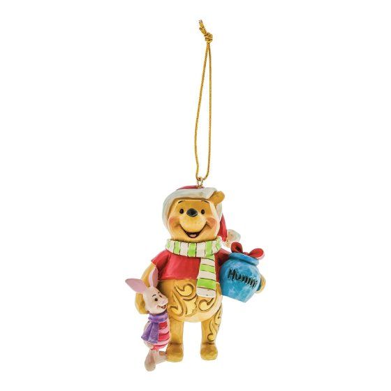 Kerstornament van Winnie de Poeh met Knorretje, die een hoed en sjaal draagt en een honingpot vasthoudt.