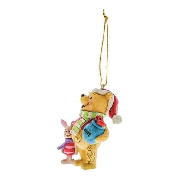 Kerstornament van Winnie de Poeh met Knorretje, die een hoed en sjaal draagt en een honingpot vasthoudt.