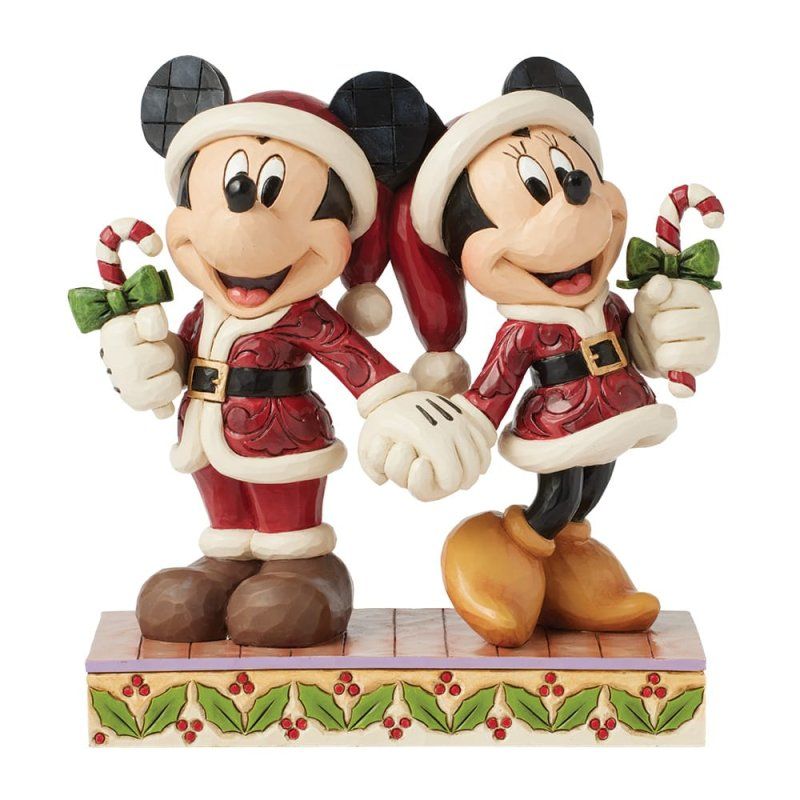 Mickey en Minnie Mouse in kerstmanpakjes, hand in hand, met zuurstokken. Figuurtje met kerstthema.