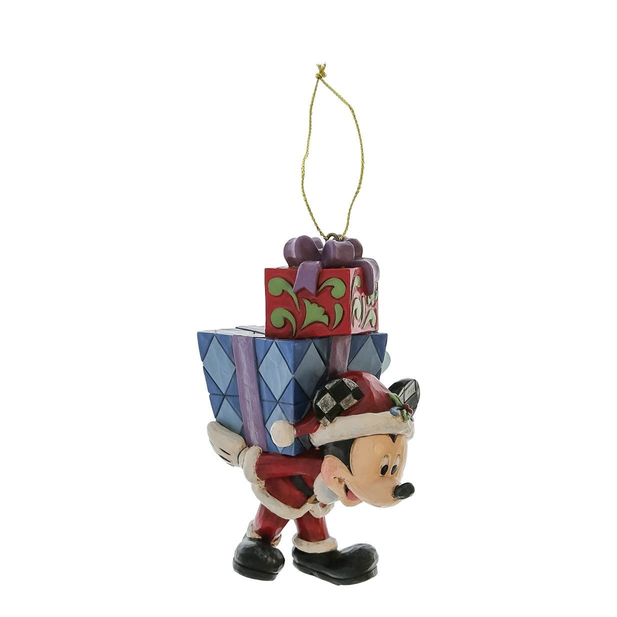 Een kerstornament van Mickey Mouse, gekleed in een kerstmanpak, draagt een stapel ingepakte cadeautjes.