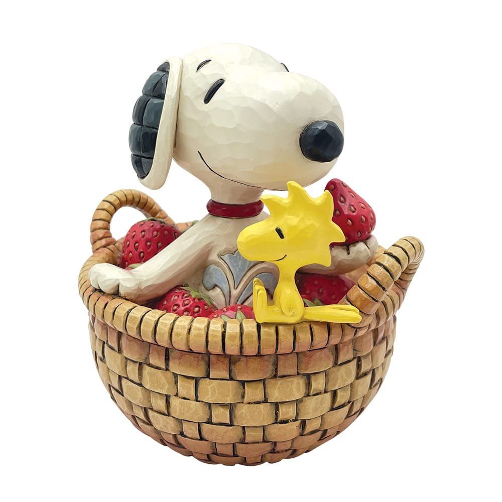 Snoopy en Woodstock in een mand met aardbeien; beiden lachend, in een gedetailleerde, houtgesneden stijl.