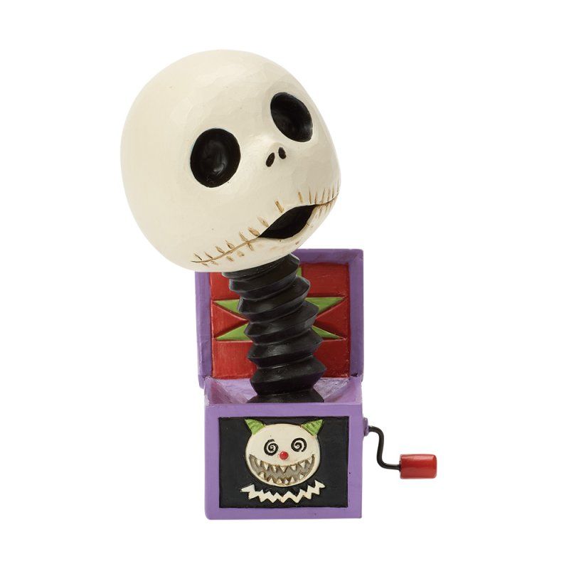 Jack Skellington bobblehead springpopje, zwarte en paarse doos, groene ster, griezelige uitdrukking.